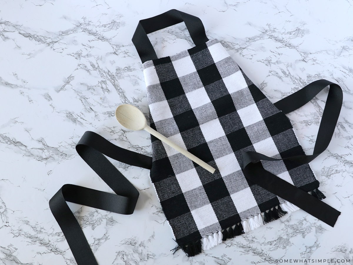 finished placemat apron with a wooden spoon