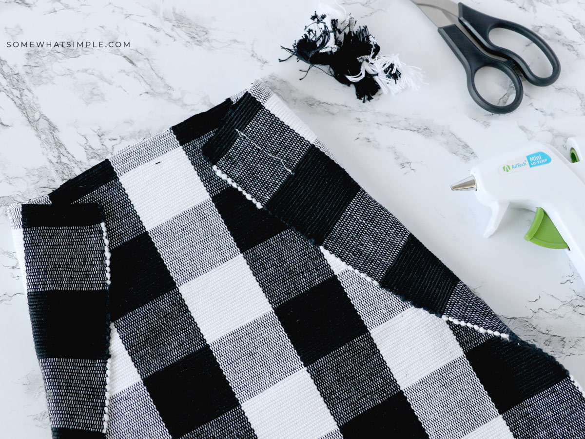 folding a placemat to make an apron for kids