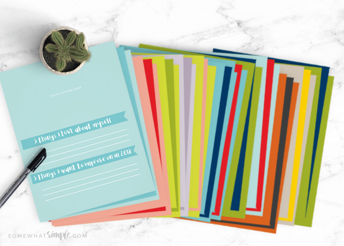 Printable journal pages for adults spread out on a counter
