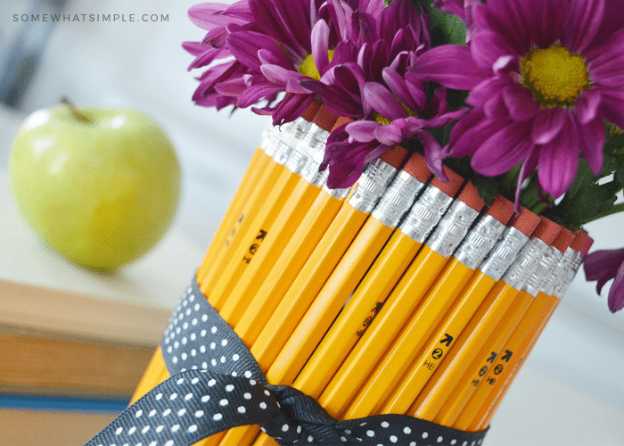 close up of flower vase wrapped in number 2 pencils