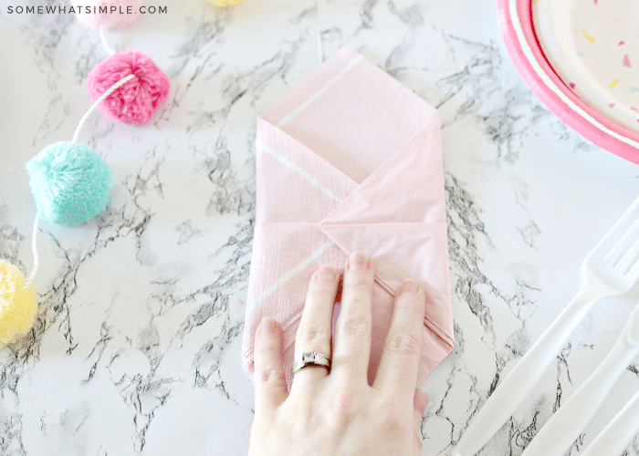 folded pink napkin for silverware