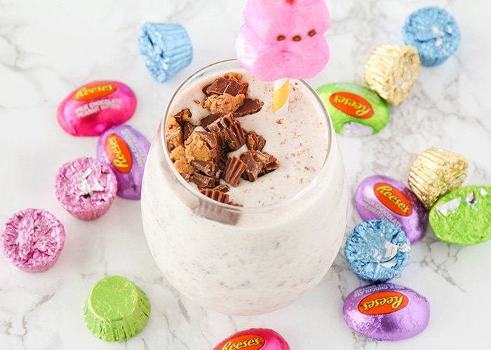 Candy Milkshakes surrounded by a bunch of easter candy on the counter