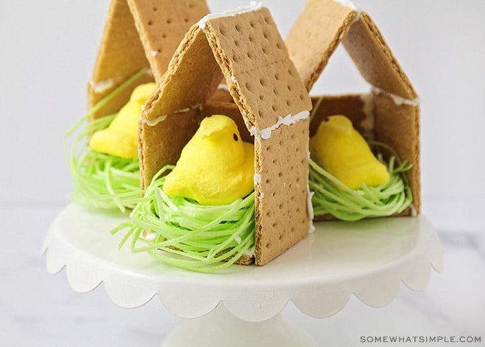 a graham cracker bird house with a peep candy