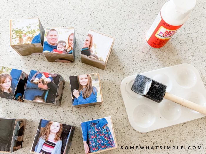 using mod podge to glue photos onto wooden blocks