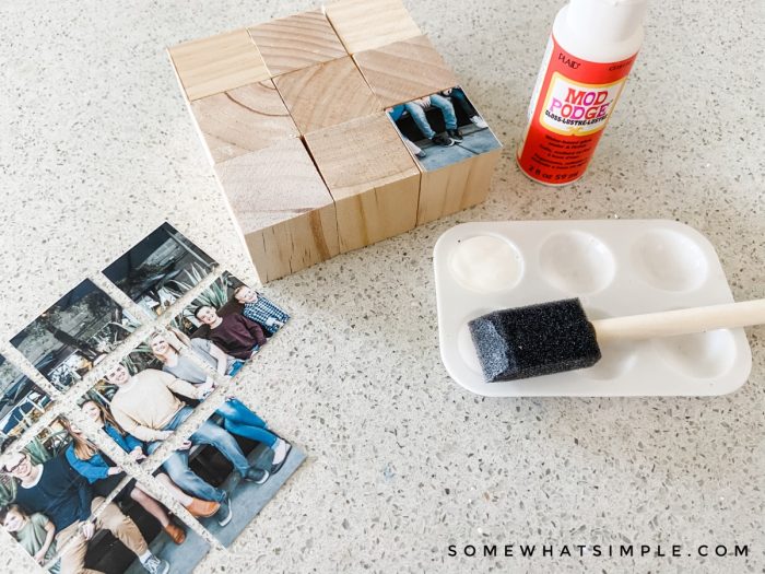 adding mod podge and pictures to a wood block