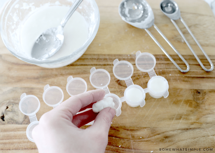 putting cornstarch mixture into paint pots