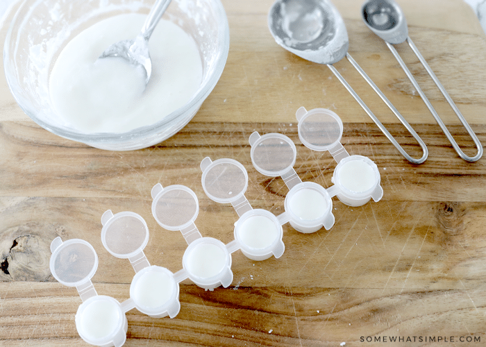 filled paint pots with homemade watercolors