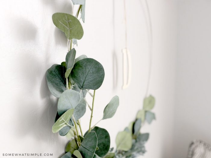 side view of greenery wreath on the wall