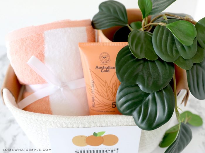 close up of a summer gift idea of a basket filled with orange items