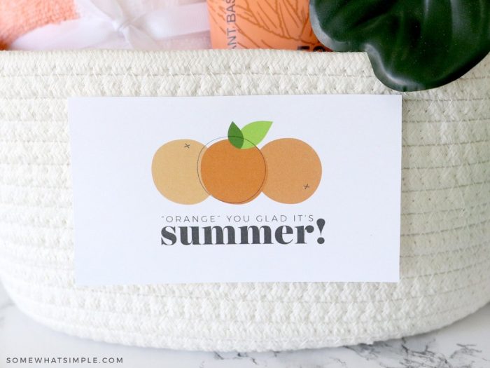close up of a gift tag that says "orange you glad its summer"