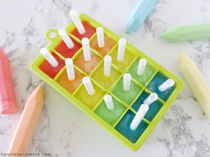 colorful rainbow of ice chalk in an ice cube tray