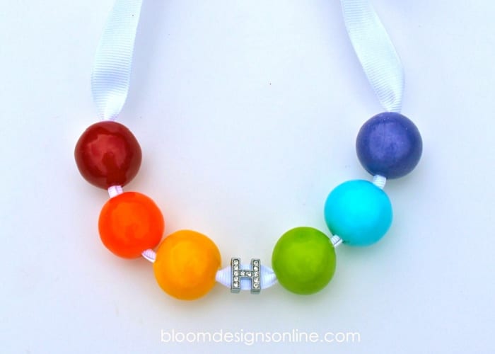 lucky charm necklace with rainbow beads