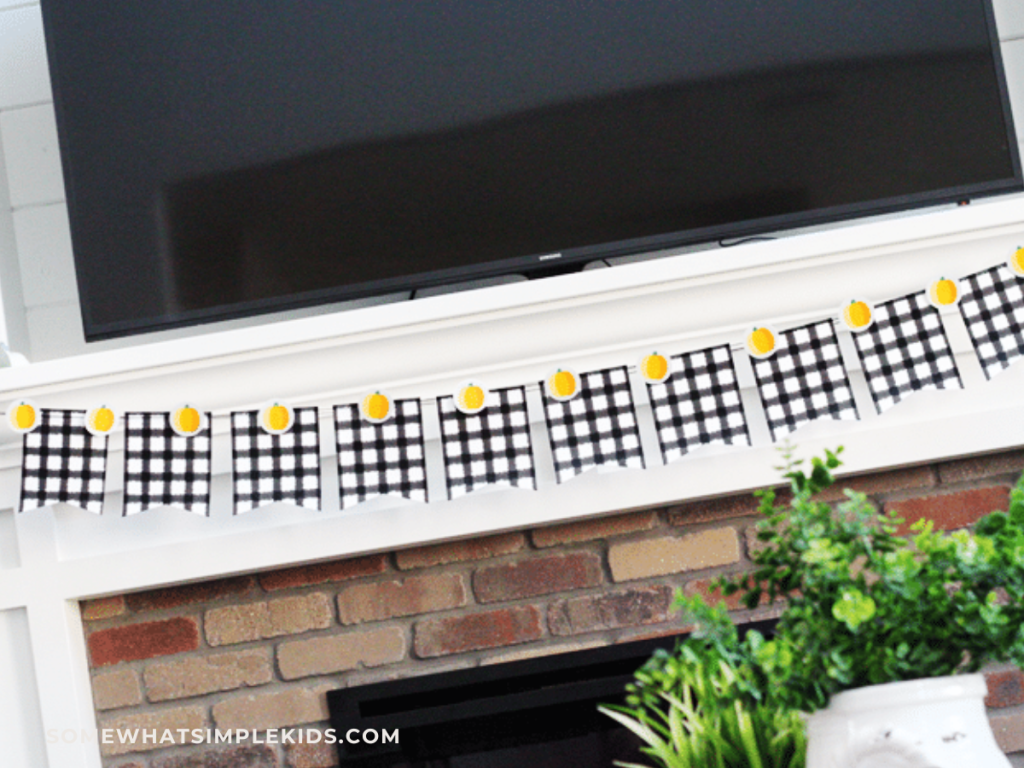 black and white checkered banner hanging over a fireplace