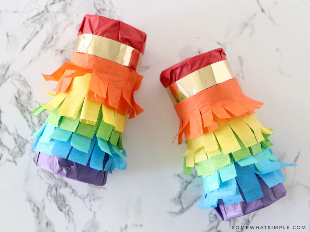 colorful homemade maracas on a white counter