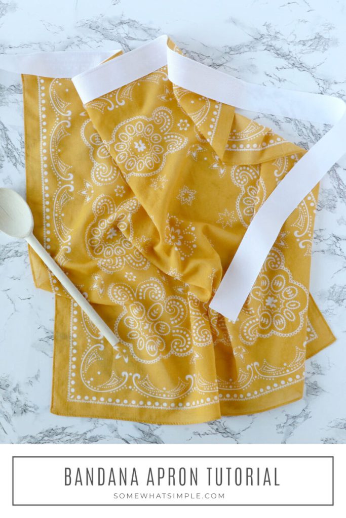 long image of a bandana apron laying on the counter