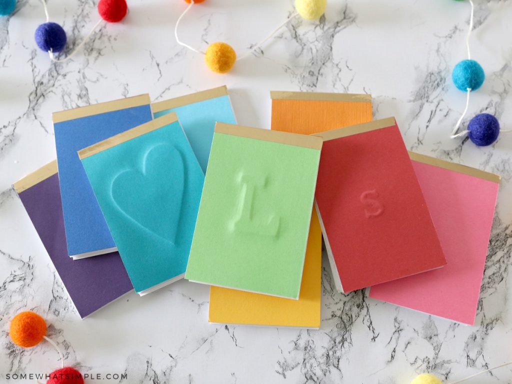 embossed notepads in rainbow colors