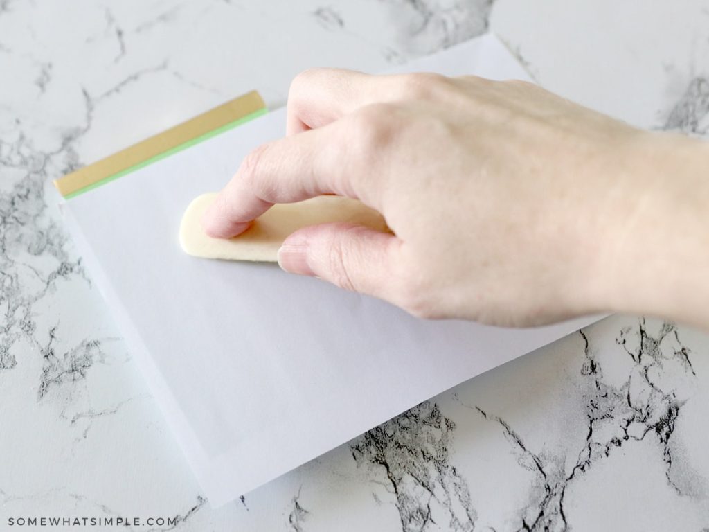 embossing a green notepad
