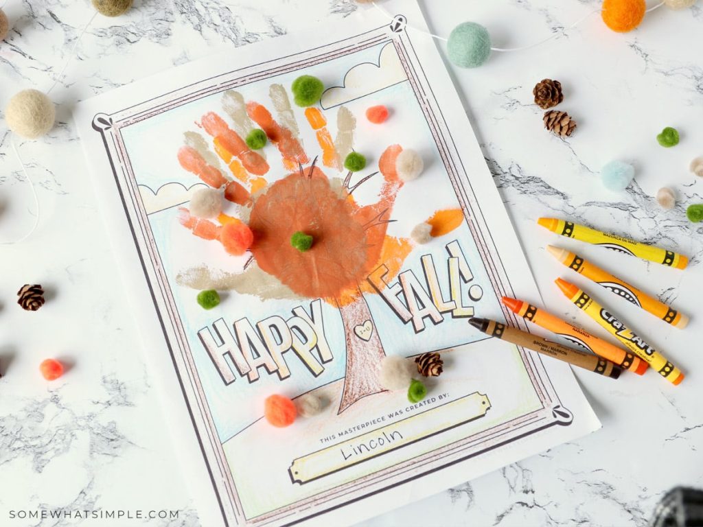 crayons next to a Fall Handprint Craft