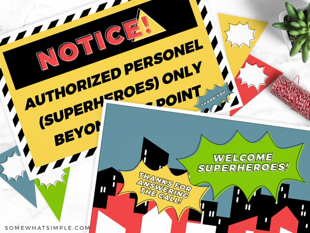 close up of 2 superhero party banners