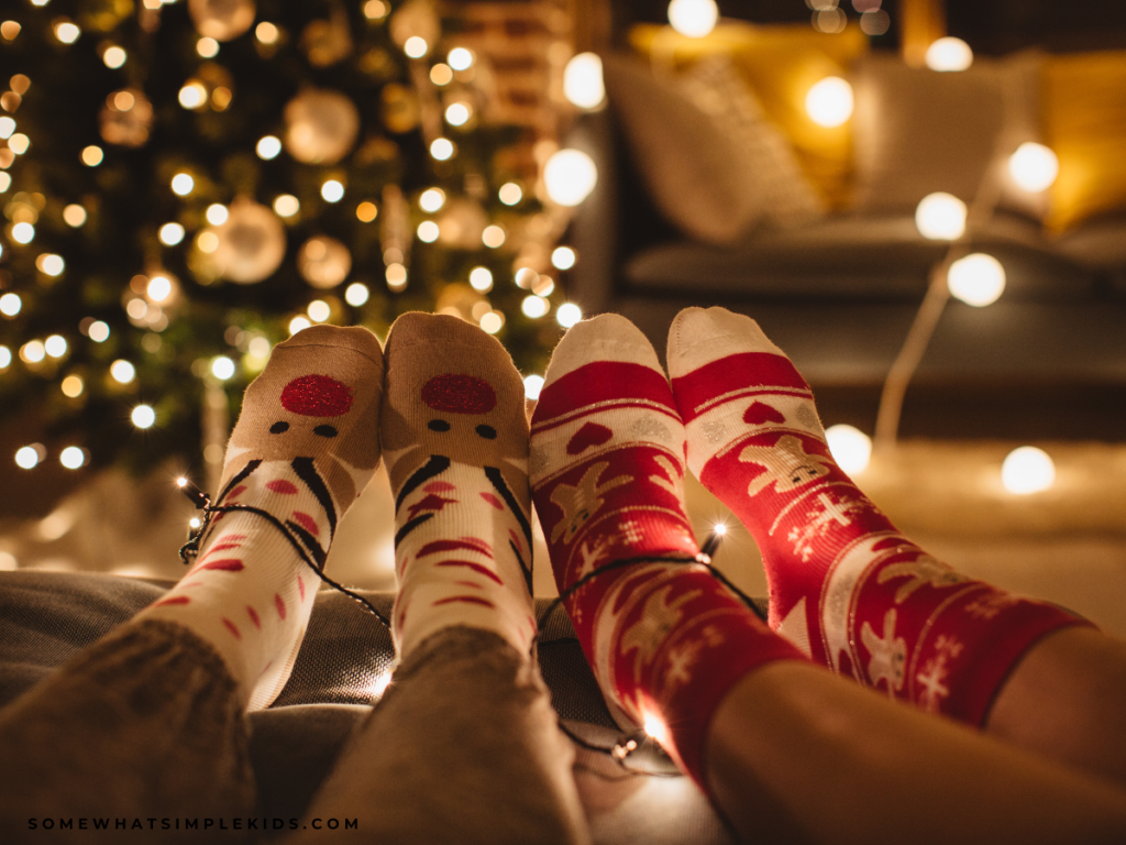 nighttime glow of a christmas tree with cozy socks