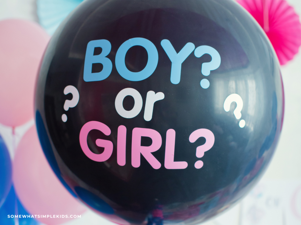 Black balloon with "Boy or Girl" on it for a gender reveal