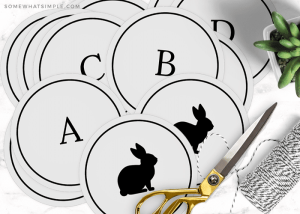 printable easter banner cut out next to gold scissors