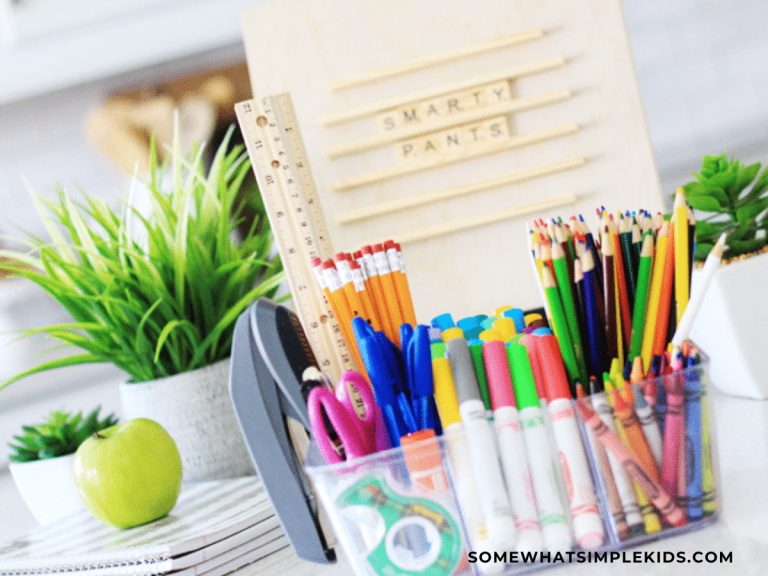 styled shot of a homework caddy with school supplies in a clear caddy