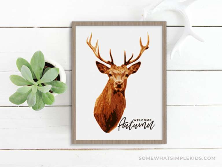 printable deer print in a frame next to a green plant