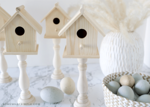 wood birdhouses on pedestals